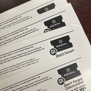 Four regal premiere movie tickets.